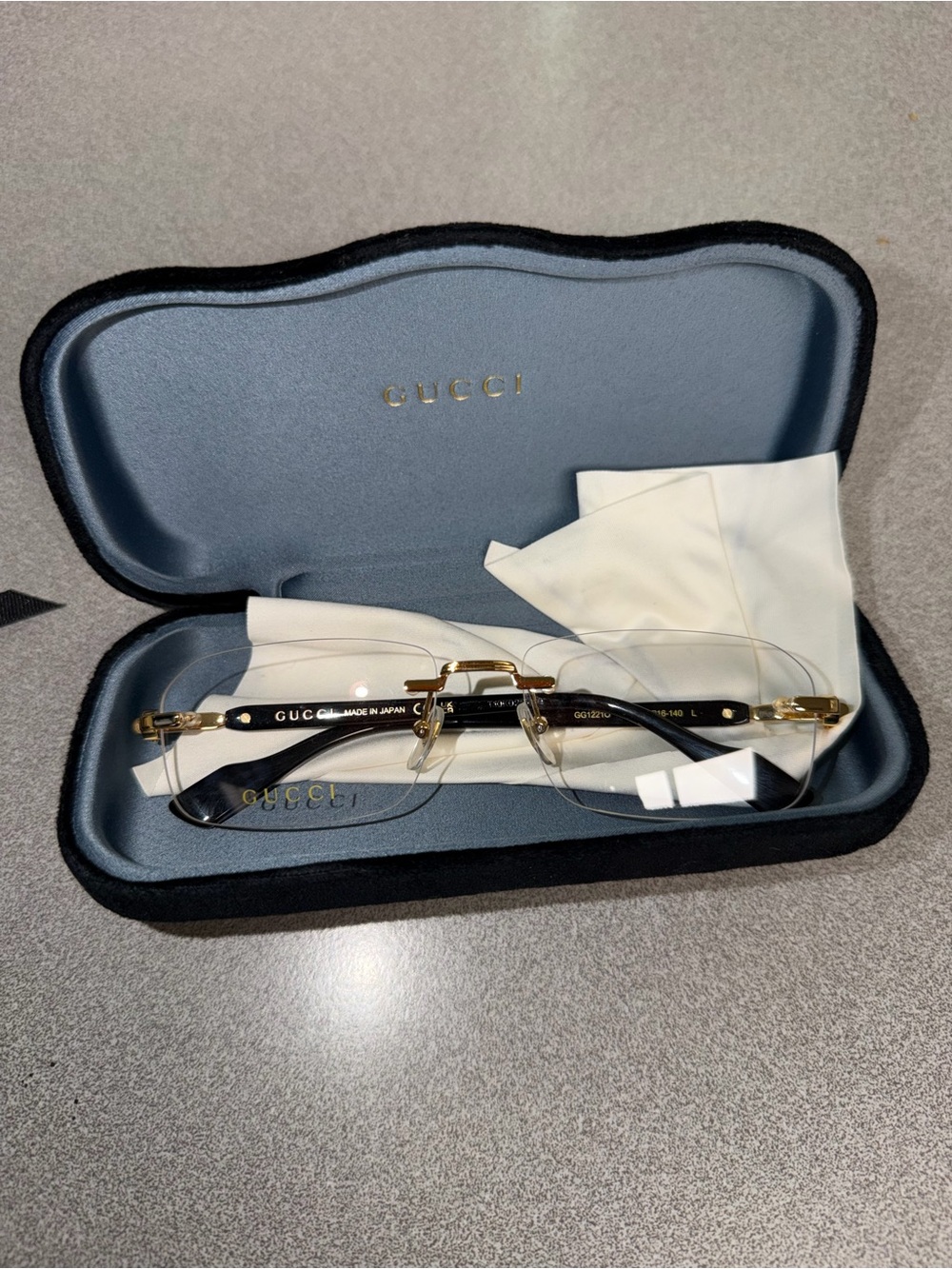 Gucci Men’s Rimless Eyeglasses Gold and Black Accents